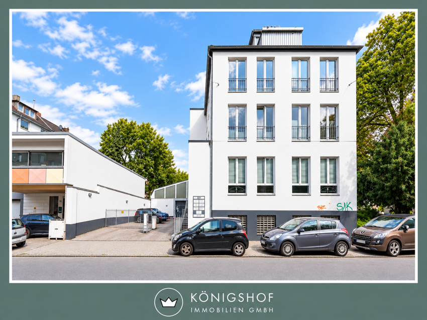 Gemütliche Dachgeschoss-Wohnung in modernem Wohn- und Geschäftshaus - Photo 4