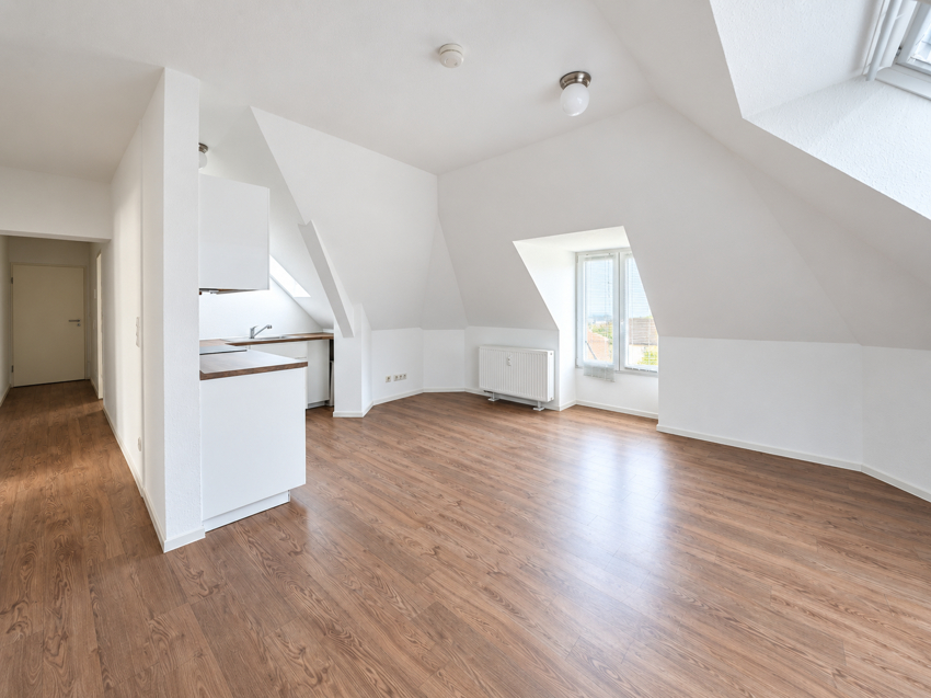 Gemütliche Dachgeschoss-Wohnung in modernem Wohn- und Geschäftshaus - Photo 5